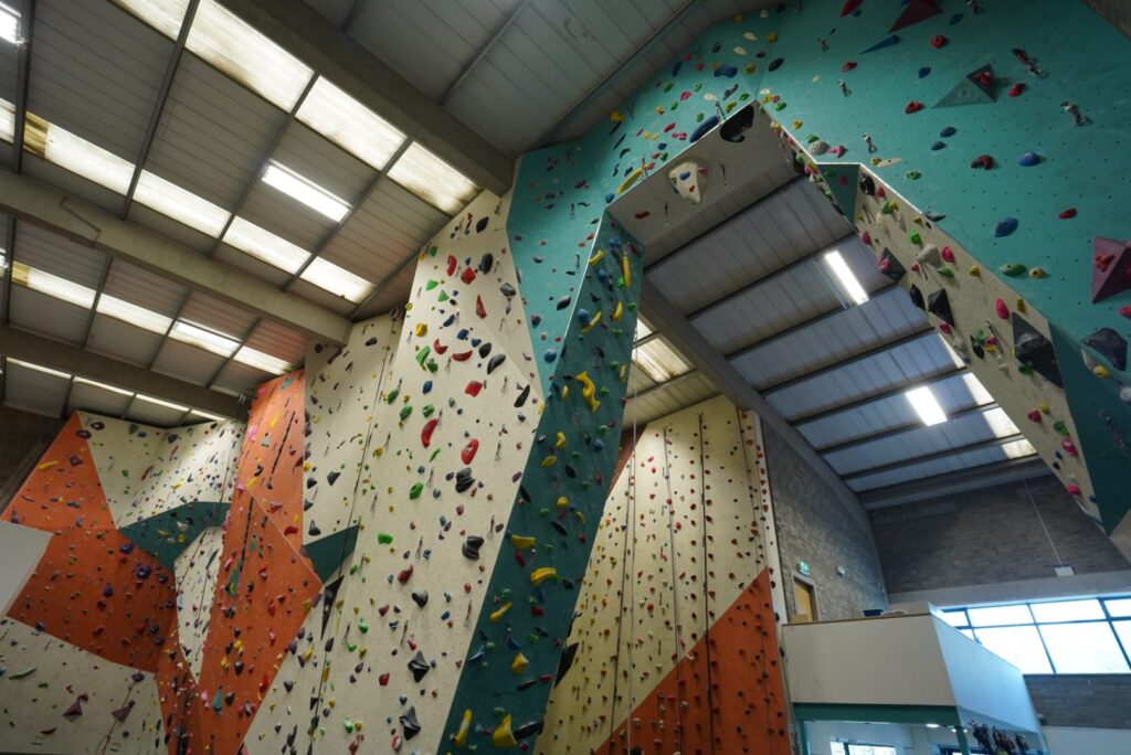 A wide-angle photo featuring various climbing surfaces including the arch, flat surfaces, and overhangs at Dublin Climbing Centre