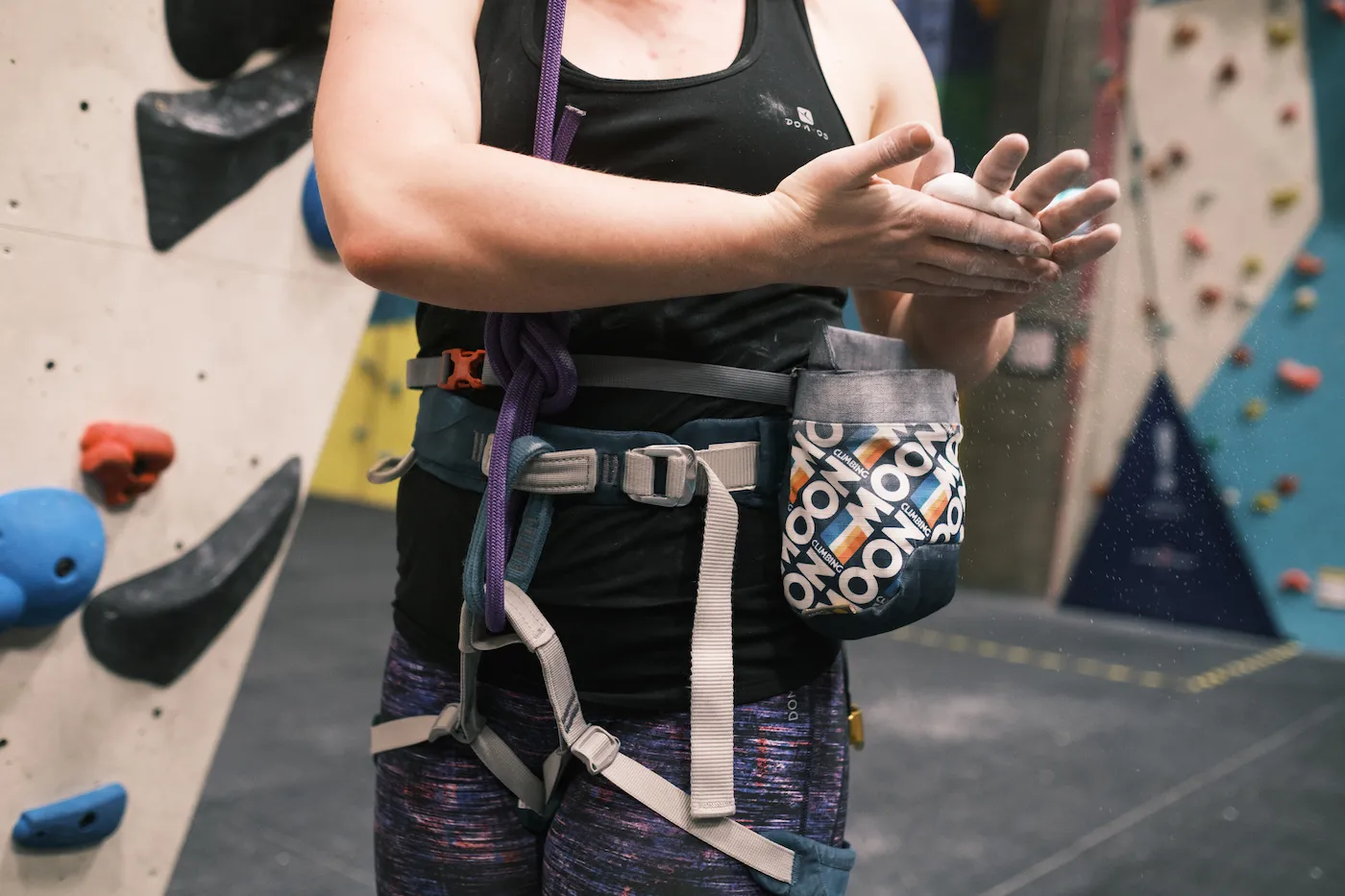 A close-up of a climber chalking their hands at Dublin Climbing Centre
