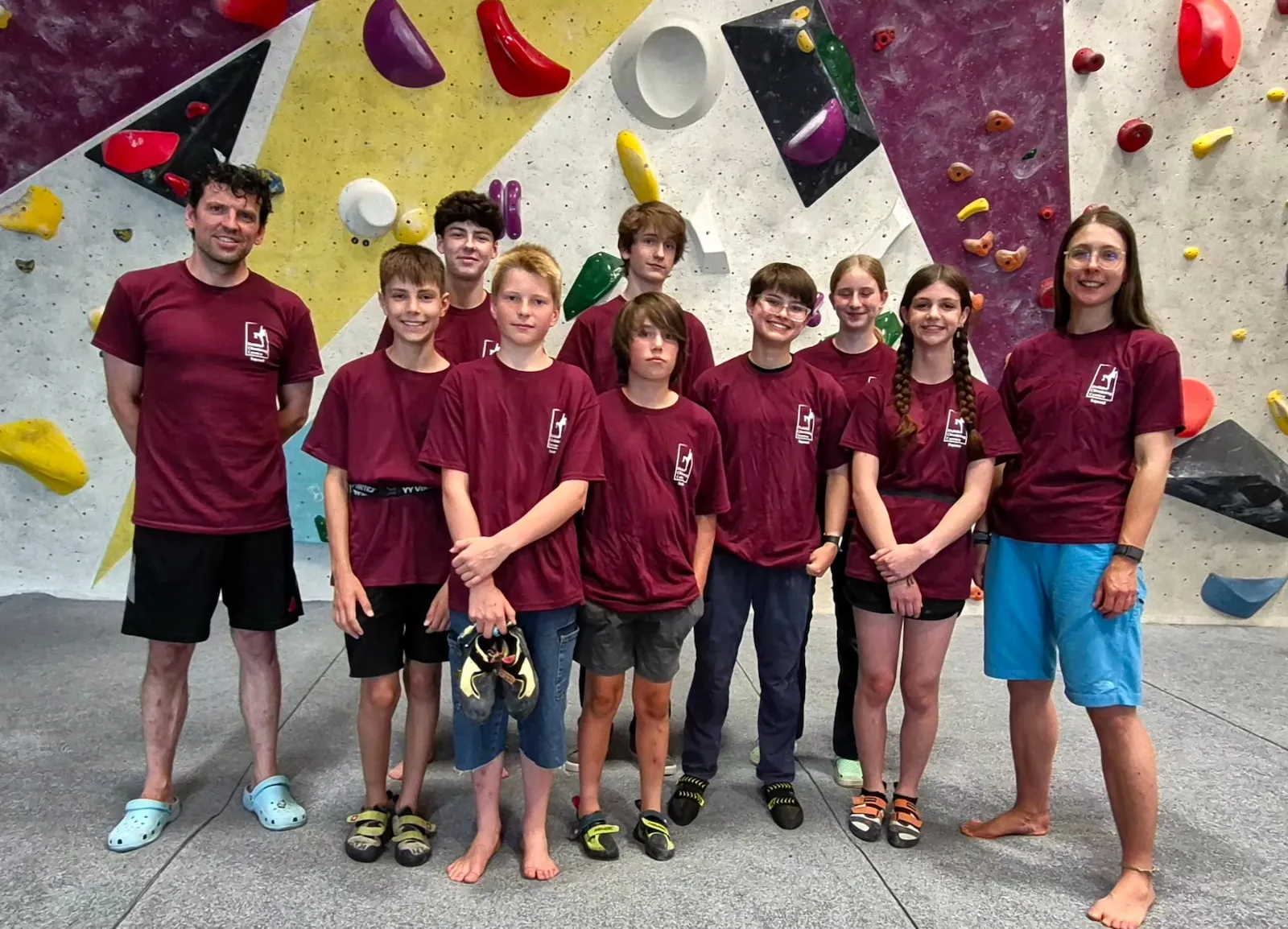 Youth Squad climbers posing for a photo at Dublin Climbing Centre