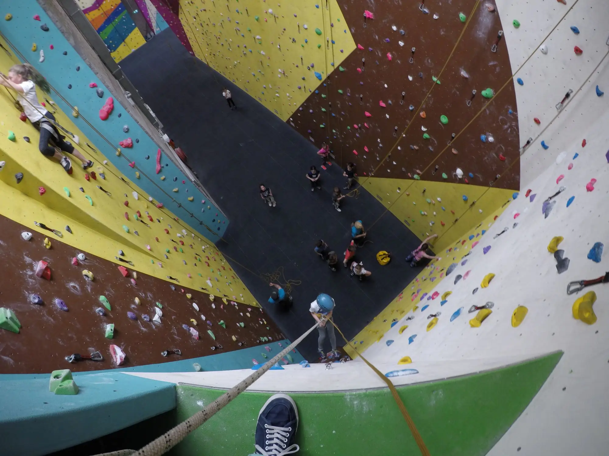 A child abseils a corner section at the Dublin Climbing Centre